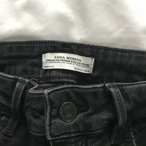 Zara black ripped skinny jeans.